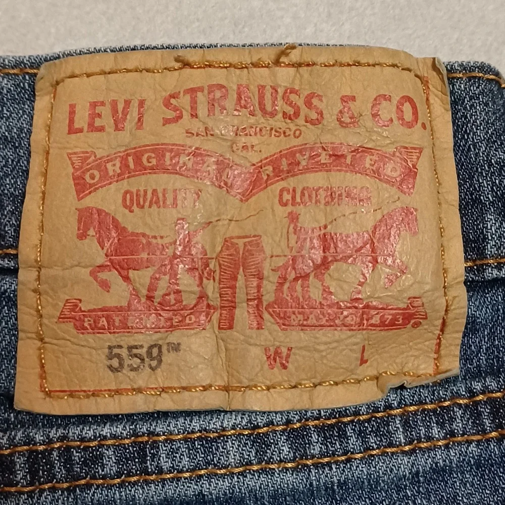 Levis 559‎ Relaxed Straight Jeans Mens 46x32 Blue Medium Wash Denim 559-0482